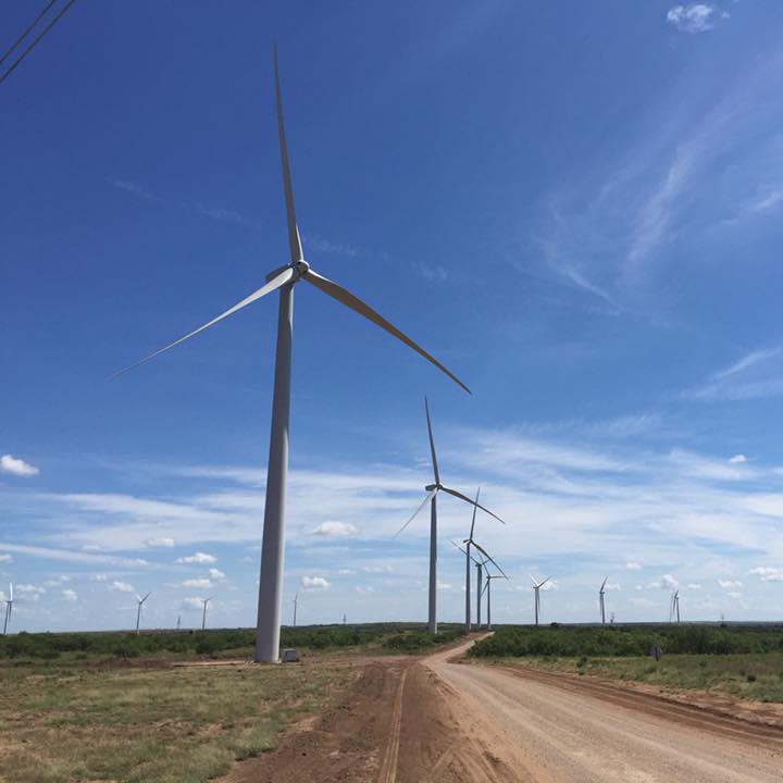 Utility-scale wind turbines at a project site